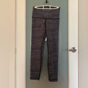 Lululemon leggings. Full-length. Black and white geometric pattern. Size 4.
